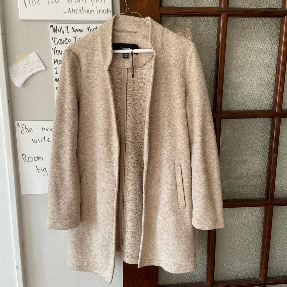 Cream colored light jacket